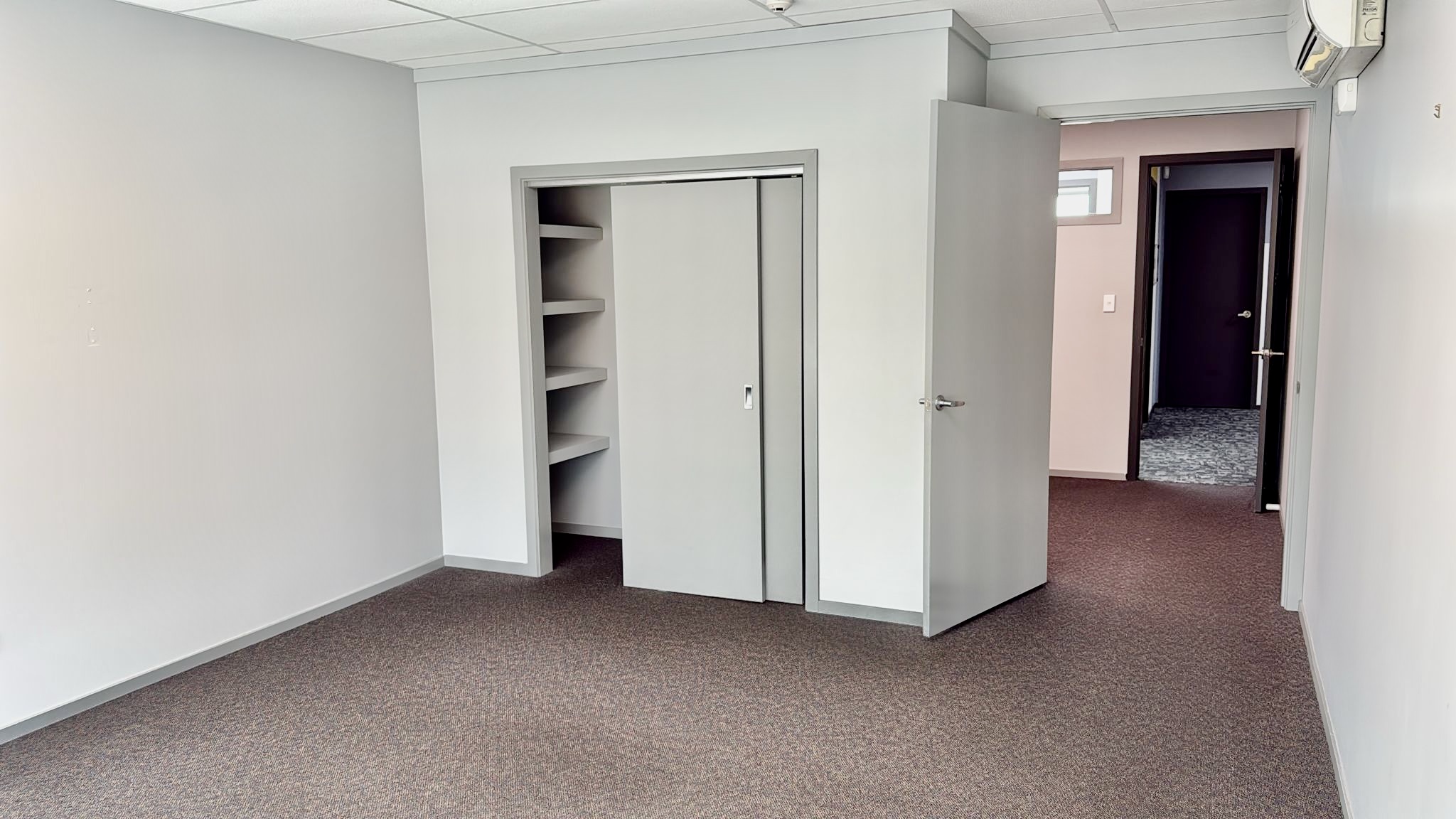 Private office with large windows and views